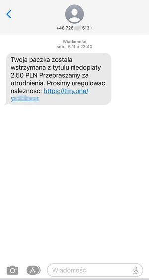 Zdjęcie przedstawia wiadomość SMS, która zawiera niebezpieczny link przygotowany przez oszustów.