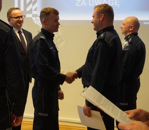 Na zdjęciu widać przebieg odprawy rocznej, policjantów i zaproszonych gości.